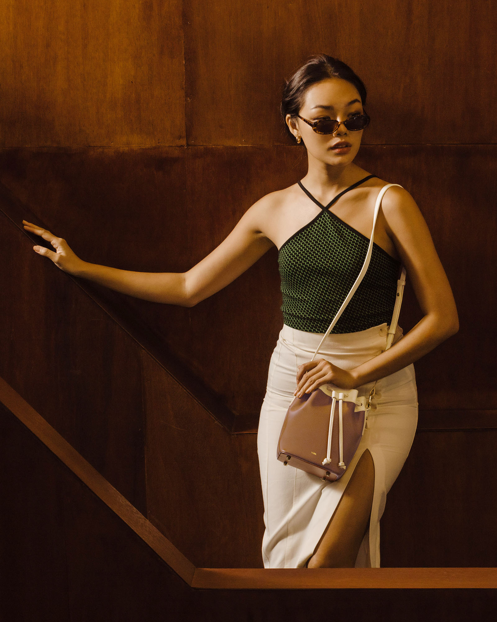 VERA Coco Bucket leather crossbody bag with a women model