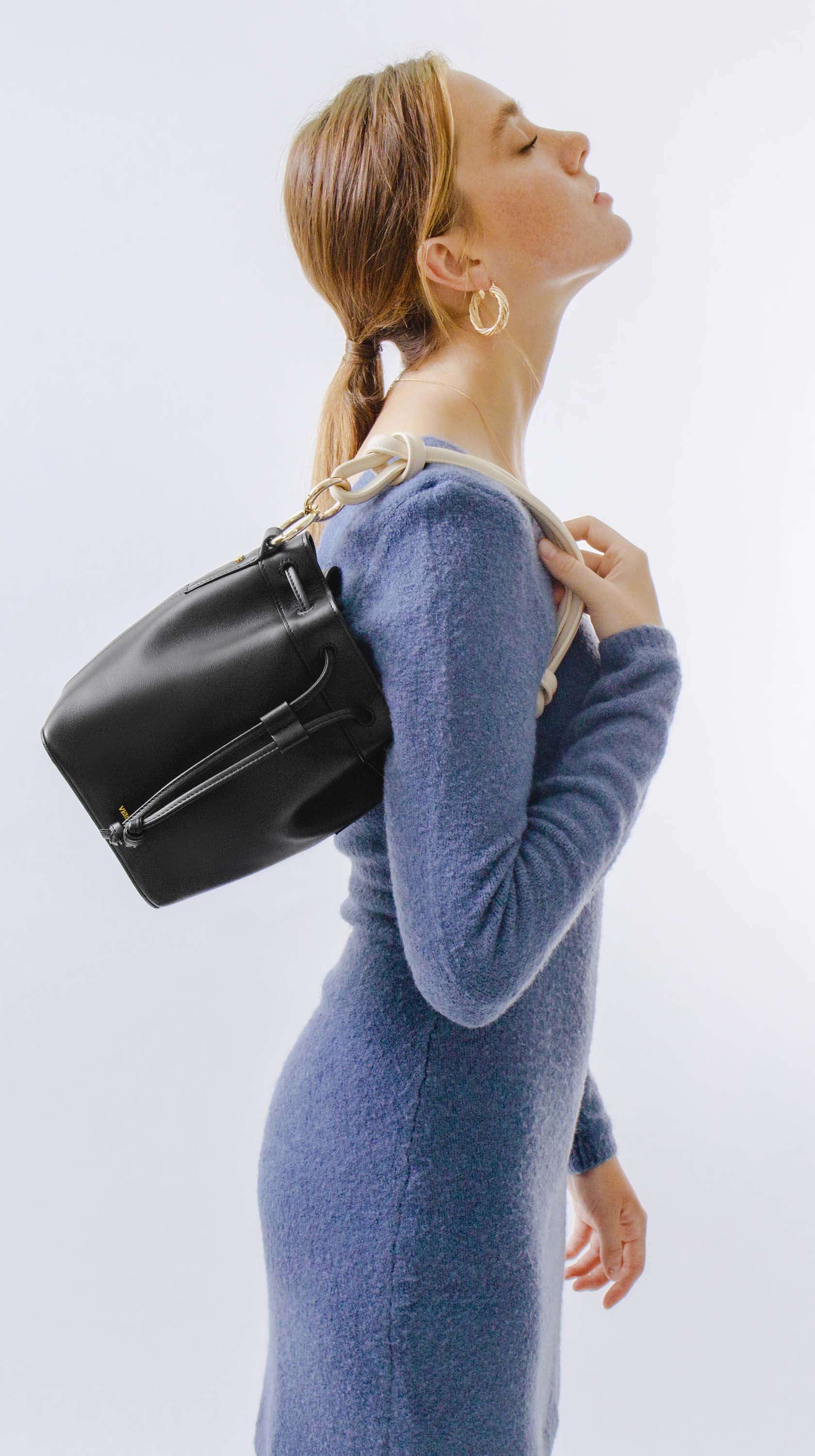 VERA Coco Bucket leather crossbody bag with a women model