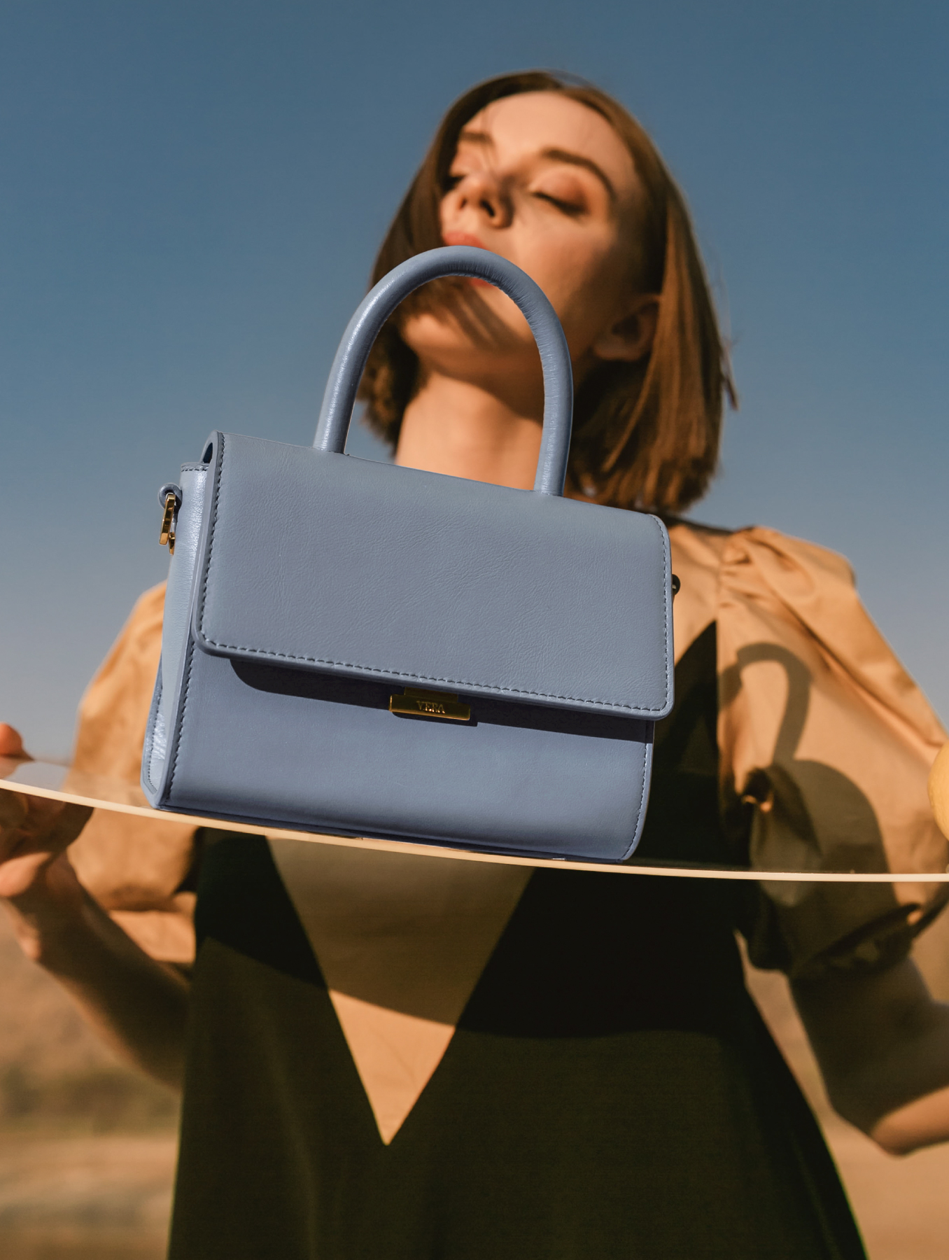 VERA Garret as Handbag