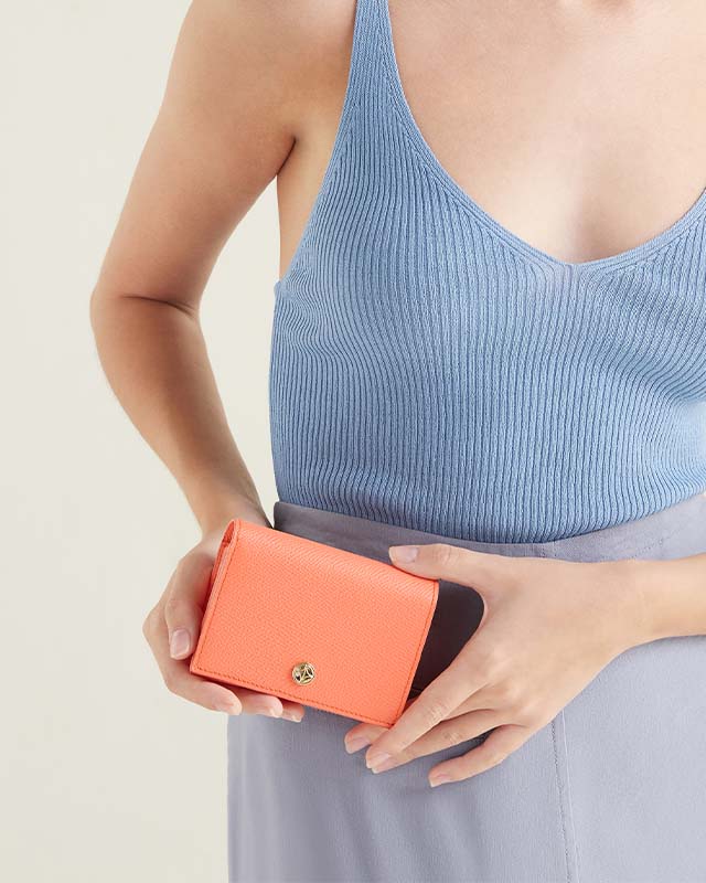 VERA Emily Flap Wallet with Leather Braided Gold Chain in Joyful Orange กระเป๋าสตางค์หนังแท้ แบบเปิดฝา พร้อมสายโซ่สีทองร้อยหนัง สีส้ม
